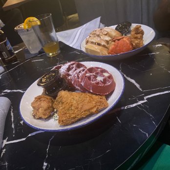 Taste Bar + Kitchen - Chicken Fried Lobster Tail and Waffles (Cinnamon Toast Crunch Waffle) Cajun Chicken Waffle (Red Velvet Waffle) - Cocktail Bars Near Me - Houston, Texas