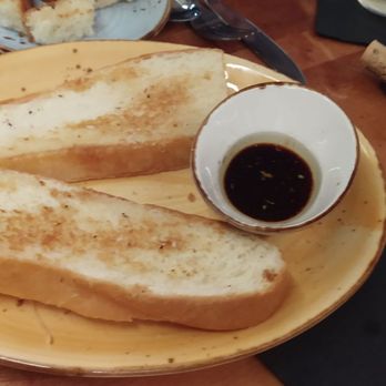 Chimney Rock Cafe - Fresh bread with olive oil with balsamic vinegar. - Breakfast & Brunch Near Me - Priest River, Idaho Chimney Rock Cafe - Fresh bread with olive oil with balsamic vinegar. - Breakfast & Brunch Near Me - Priest River, Idaho