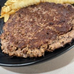 The Depot Cafe - Grilled burger Patty with crinkle cut fries