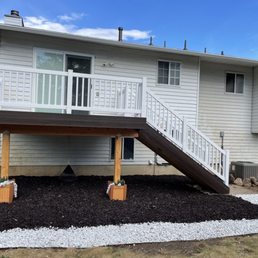 Chocolate color bark mulch and white lava rock!