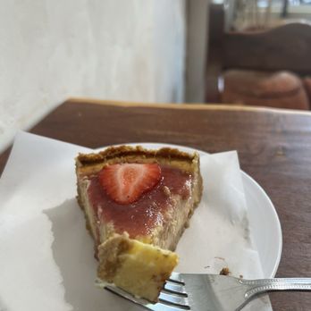 Pan Tostado Cafe - Mexican Cheesecake w/ Strawberry sauce - Creperies Near Me - Georgetown, Texas Pan Tostado Cafe - Mexican Cheesecake w/ Strawberry sauce - Creperies Near Me - Georgetown, Texas