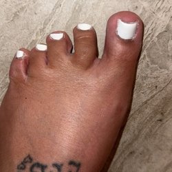 Q & N Nails - Left foot horrible paint job and feet that need to be pedicured
