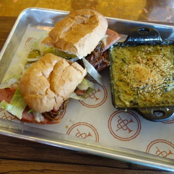 The Second Line - The Johnny Snack - Hot Ham + Cheese with Beef Debris with Spinach Madeline - Cajun/Creole Near Me - Memphis, Tennessee The Second Line - The Johnny Snack - Hot Ham + Cheese with Beef Debris with Spinach Madeline - Cajun/Creole Near Me - Memphis, Tennessee