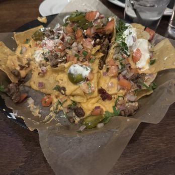 River Street Tavern - STEAK TAVERN NACHOS - American Near Me - East Dundee, Illinois River Street Tavern - STEAK TAVERN NACHOS - American Near Me - East Dundee, Illinois