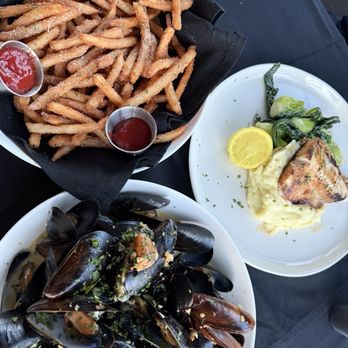 Yellowfin Steak and Fish House - PEI Mussels, Golden Miso Sablefish, and a large order of crunchy truffle fries. - Steakhouses Near Me - Edgewater, Maryland Yellowfin Steak and Fish House - PEI Mussels, Golden Miso Sablefish, and a large order of crunchy truffle fries. - Steakhouses Near Me - Edgewater, Maryland