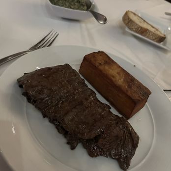 Opus Steakhouse - Skirt Steak with potato pave and creamed spinach - Wine Bars Near Me - Jericho, New York Opus Steakhouse - Skirt Steak with potato pave and creamed spinach - Wine Bars Near Me - Jericho, New York