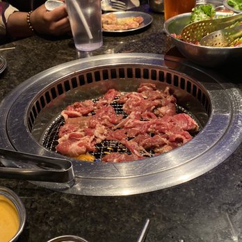 Iron Age - Grill cooking the beef. It was very good! - Korean Near Me - Catonsville, Maryland Iron Age - Grill cooking the beef. It was very good! - Korean Near Me - Catonsville, Maryland
