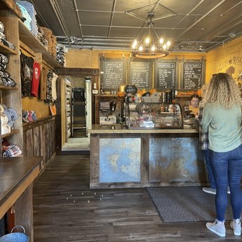 Cody Road Coffee - a woman standing in a coffee shop - Coffee & Tea Near Me - Le Claire, Iowa Cody Road Coffee - a woman standing in a coffee shop - Coffee & Tea Near Me - Le Claire, Iowa