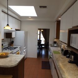 The Wilshire House Phoenix - Remodeled kitchen with all-new appliances with multiple cooking utensils and plenty of dishes and glasses for everyone.