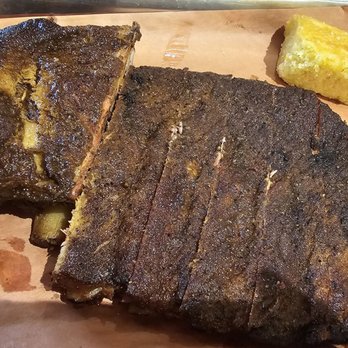 Just Smokin' Barbecue - Half rack of ribs and a piece of cornbread - Barbeque Near Me - Lannon, Wisconsin
