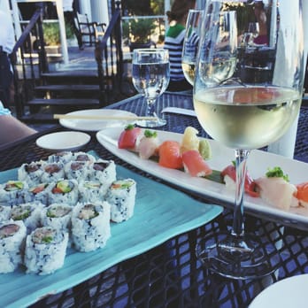 Shiro Restaurant - Outdoor patio table. White wine. Salmon roll, tuna roll, yellowtail roll. Various nigiri. - Japanese Near Me - Novi, Michigan