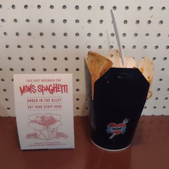 Mom's Spaghetti - Table sign next to my takeout container - Sandwiches Near Me - Detroit, Michigan Mom's Spaghetti - Table sign next to my takeout container - Sandwiches Near Me - Detroit, Michigan