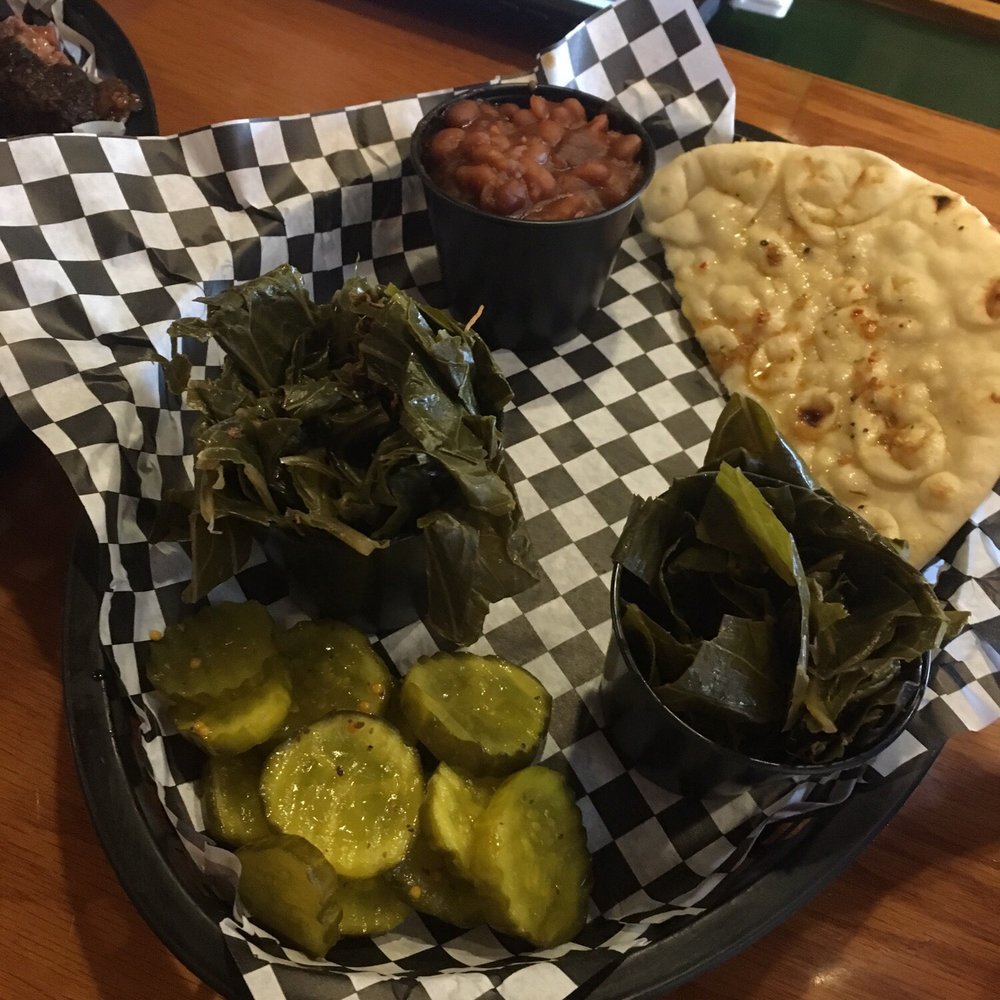 Collard greens, baked beans, pickles and garlic pita