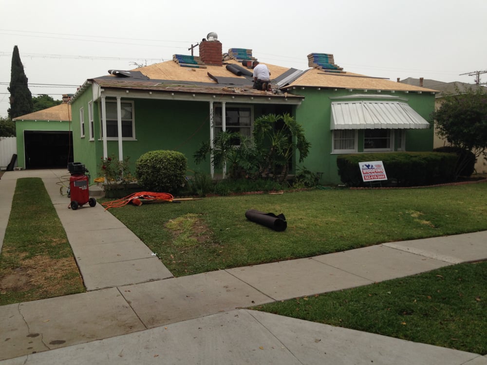 Slide of Hector's Roofing