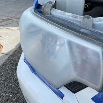 Integrity Automotive Detailing - Headlight before restoration - Auto Detailing Near Me