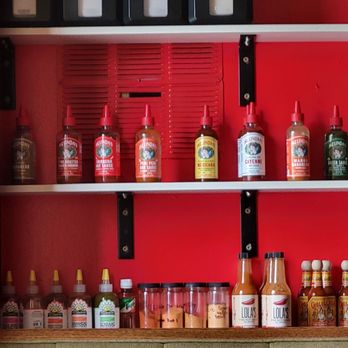 Rudy's Tacos - a shelf full of bottles - Mexican Near Me - Waterloo, Iowa Rudy's Tacos - a shelf full of bottles - Mexican Near Me - Waterloo, Iowa