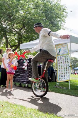 Event Entertainment by Tuxedo Jimmy - The hardest working balloon guy in the biz, Tuxedo Jimmy is Portland’s funniest balloon twister, juggler, and unicycle artist. A popular Saturday Market landmark, Tuxedo Jimmy can be seen twisting balloon animals & hats, juggling pins, riding his unicycle, or telling jokes in one of his colorful vintage tuxedos. Event Entertainment by Tuxedo Jimmy - The hardest working balloon guy in the biz, Tuxedo Jimmy is Portland’s funniest balloon twister, juggler, and unicycle artist. A popular Saturday Market landmark, Tuxedo Jimmy can be seen twisting balloon animals & hats, juggling pins, riding his unicycle, or telling jokes in one of his colorful vintage tuxedos.