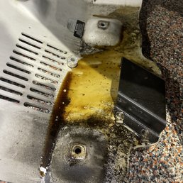 Skid plate full of oil 3 weeks after oil change. Skid plate full of oil 3 weeks after oil change.