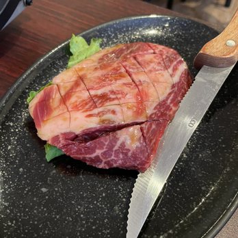 Yakiniku Sizzle - Happy hour special - Marinated short rib $20 discounted to $12. - Japanese Near Me - Honolulu, Hawaii Yakiniku Sizzle - Happy hour special - Marinated short rib $20 discounted to $12. - Japanese Near Me - Honolulu, Hawaii