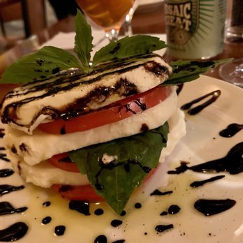 Osteria Rago - Caprese, made with homemade mozzarella - Italian Near Me - Bloomington, Indiana