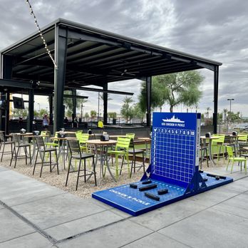 Chicken N Pickle - Outdoor courts and giant battleship. - Pickleball Near Me - Glendale, Arizona