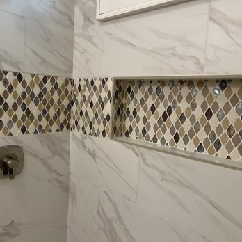 TNT Tile - a shower with a tiled wall - Tiling Near Me TNT Tile - a shower with a tiled wall - Tiling Near Me
