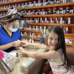 My sweet princess getting her very first full manicure with Bright Sparkle Pink polish!!! My sweet princess getting her very first full manicure with Bright Sparkle Pink polish!!!