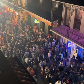 Mambo’s - Looking down on Bourbon Street from the roof top patio - Cajun/Creole Near Me - New Orleans, Louisiana Mambo’s - Looking down on Bourbon Street from the roof top patio - Cajun/Creole Near Me - New Orleans, Louisiana