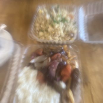Al Toque Peruvian Kitchen - Top- seafood fried rice Bottom- Lomo Saltado - Peruvian Near Me - Oceanside, California