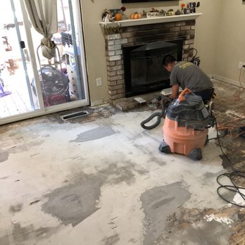 Solano Hardwoods - Patching my terrible subfloor and saving me some money. Also cut the brick around the fireplace for a much cleaner flooring install. - Flooring Near Me - Vacaville, California