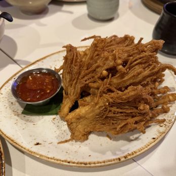 Osha Thai Kitchen - Fried Enoki Mushrooms - lightly tempura batter fried Enoki mushroom. Served with sweet chili sauce - Thai Near Me - Houston, Texas Osha Thai Kitchen - Fried Enoki Mushrooms - lightly tempura batter fried Enoki mushroom. Served with sweet chili sauce - Thai Near Me - Houston, Texas