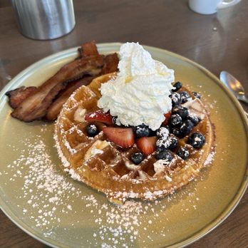OEB Breakfast - Mission - Waffle with berries & whip cream. And a side of bacon!! - Breakfast & Brunch Near Me - Calgary, Alberta