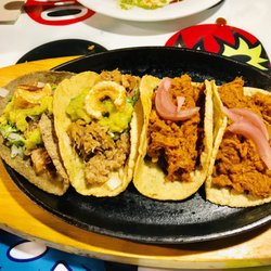 La Adelita - Cochinito Pibil tacos on the left & Carnitas tacos on the right