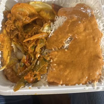 Tikka House - Fish in a bed of rice. - Indian Near Me - Louisville, Kentucky Tikka House - Fish in a bed of rice. - Indian Near Me - Louisville, Kentucky