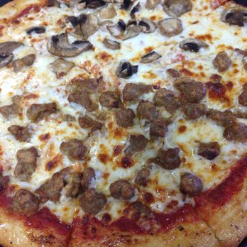 Chuck E. Cheese - Half sausage half mushroom medium - Pizza Near Me - Oklahoma City, Oklahoma