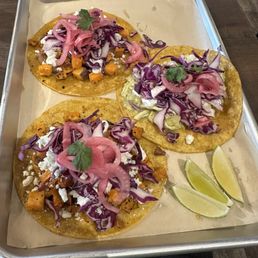 Two sweet potato tacos and a chicken tinga taco. DELICIOUS. Two sweet potato tacos and a chicken tinga taco. DELICIOUS.