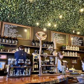 Monkey Cup - a man and a woman working at a bar - Coffee & Tea Near Me - New York, New York