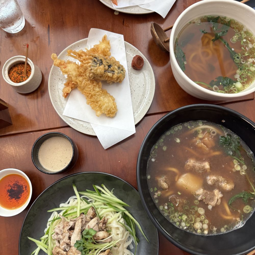 Raku - From top to bottom: ebiten udon w/shrimp tempura; veggie tempura; niku udon; and buta shabu - Japanese Near Me - New York, New York Raku - From top to bottom: ebiten udon w/shrimp tempura; veggie tempura; niku udon; and buta shabu - Japanese Near Me - New York, New York