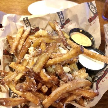 Jake Melnick's Corner Tap - Parmesan garlic fries. Ask for sriracha mayo to dip... trust me. - Sports Bars Near Me - Chicago, Illinois Jake Melnick's Corner Tap - Parmesan garlic fries. Ask for sriracha mayo to dip... trust me. - Sports Bars Near Me - Chicago, Illinois