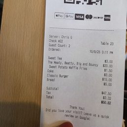 $50 for 2 burgers, soda/tea and bread?? $50 for 2 burgers, soda/tea and bread??