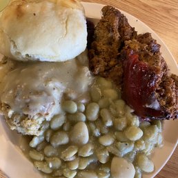 Meatloaf, Lima beans, dressing & turkey gravy, and a biscuit.
