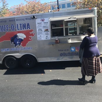 Buff-o-lina NC - ows a woman standing in front of a food truck - Food Trucks Near Me Buff-o-lina NC - ows a woman standing in front of a food truck - Food Trucks Near Me