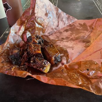 Lockhart Smokehouse - More burnt ends and greasiness (check out the shiny grease stains (1:00 position). It was everywhere - Barbeque Near Me - Plano, Texas Lockhart Smokehouse - More burnt ends and greasiness (check out the shiny grease stains (1:00 position). It was everywhere - Barbeque Near Me - Plano, Texas