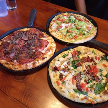 Moose's Tooth - Front- chicken Rockefeller Middle- carnivore Back- barbecue chicken - Pizza Near Me - Anchorage, Alaska Moose's Tooth - Front- chicken Rockefeller Middle- carnivore Back- barbecue chicken - Pizza Near Me - Anchorage, Alaska