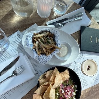 Earls Kitchen + Bar - Charred Corn + Avocado Dip and Truffle Fries - New American Near Me - McLean, Virginia Earls Kitchen + Bar - Charred Corn + Avocado Dip and Truffle Fries - New American Near Me - McLean, Virginia