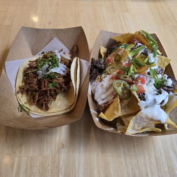 Taco Bamba Nashville - Slow Roasted Lamb Birria Taco and El Bacho Nachos ( Beef, Salsa Morita, Crema, Nacho Cheese, Pico, Onions and Jalepeno) - Tacos Near Me - Nashville, Tennessee Taco Bamba Nashville - Slow Roasted Lamb Birria Taco and El Bacho Nachos ( Beef, Salsa Morita, Crema, Nacho Cheese, Pico, Onions and Jalepeno) - Tacos Near Me - Nashville, Tennessee
