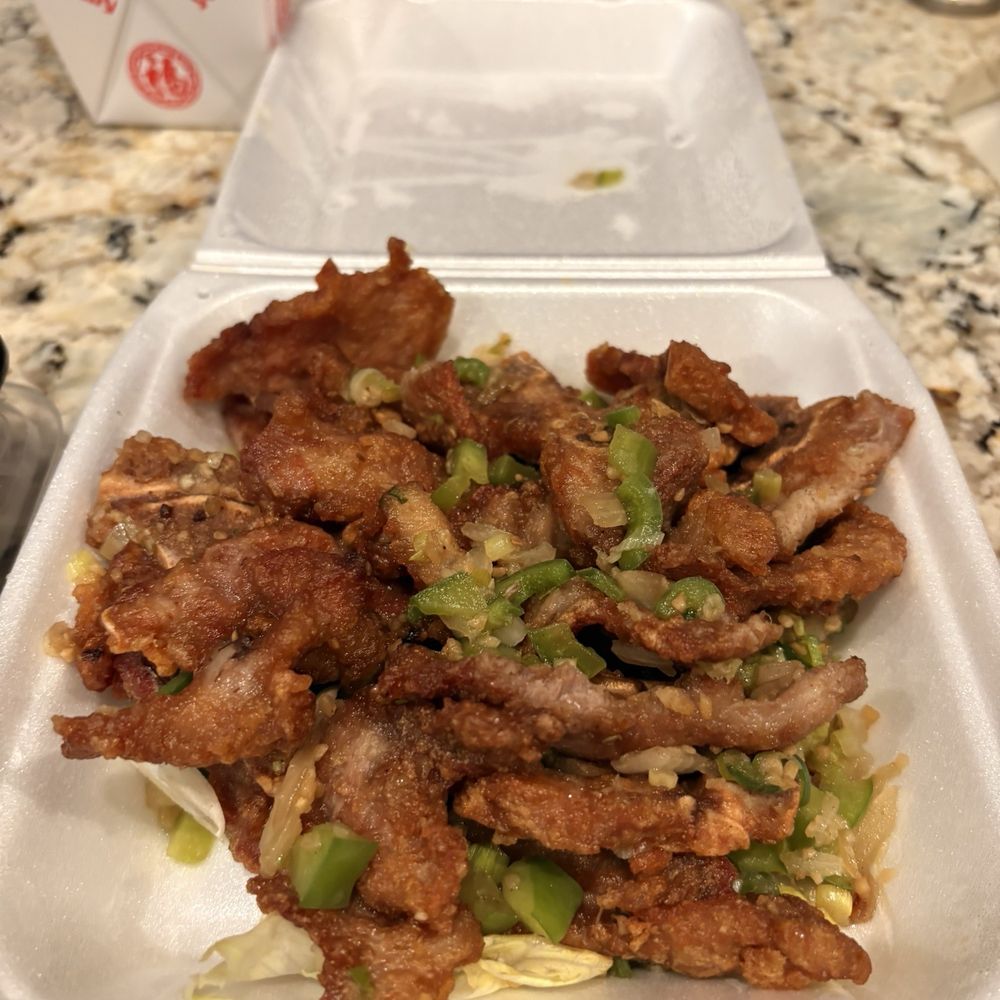 Dragon Bite - Salt & Pepper Pork Chop Special was good.  Personally I prefer more peppers and heat.  Both servings included rice - Chinese Near Me - Henderson, Nevada