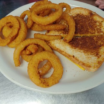 Poochie's Place - Grilled Cheese with onion rings other side was burnt. - Breakfast & Brunch Near Me - Amelia, Ohio Poochie's Place - Grilled Cheese with onion rings other side was burnt. - Breakfast & Brunch Near Me - Amelia, Ohio