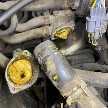 Chevo's Auto Radiator Service - Example of old coolant needing a complete power flush of the entire system - Auto Repair Near Me - Hammond, Indiana Chevo's Auto Radiator Service - Example of old coolant needing a complete power flush of the entire system - Auto Repair Near Me - Hammond, Indiana