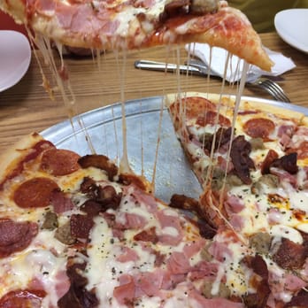 Sliced Pizza and More - Meat lovers pizza. More than we could eat. - Pizza Near Me - Manassas, Virginia Sliced Pizza and More - Meat lovers pizza. More than we could eat. - Pizza Near Me - Manassas, Virginia